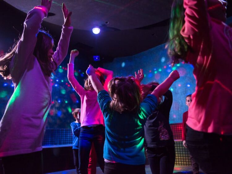 Children having fun at a supervised kids’ club, giving parents peace of mind during a stress-free family vacation.