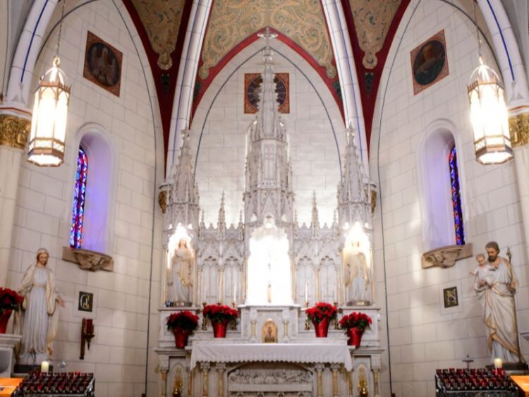 Loretto Chapel in Santa Fe featuring the Miraculous Staircase and quiet space for meditation.