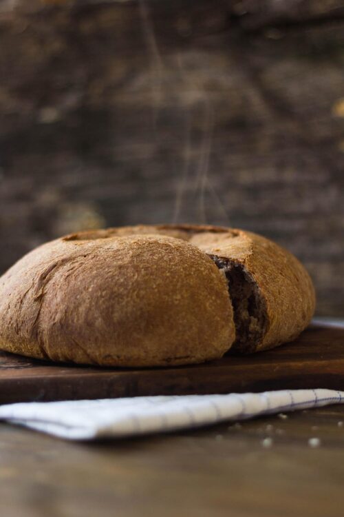 Baking as sensory mindfulness, with the smell and sight of sourdough baking creating grounding and stress relief.