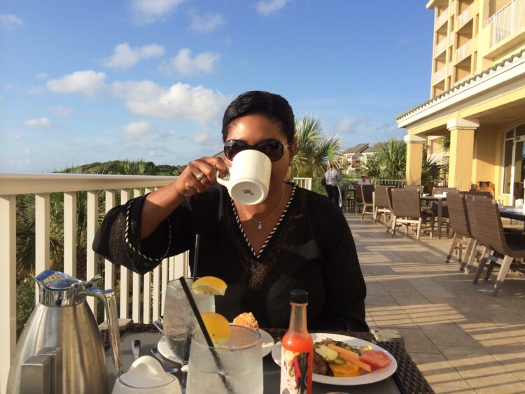 mindful travel reflection on balcony at Amelia Island, Florida