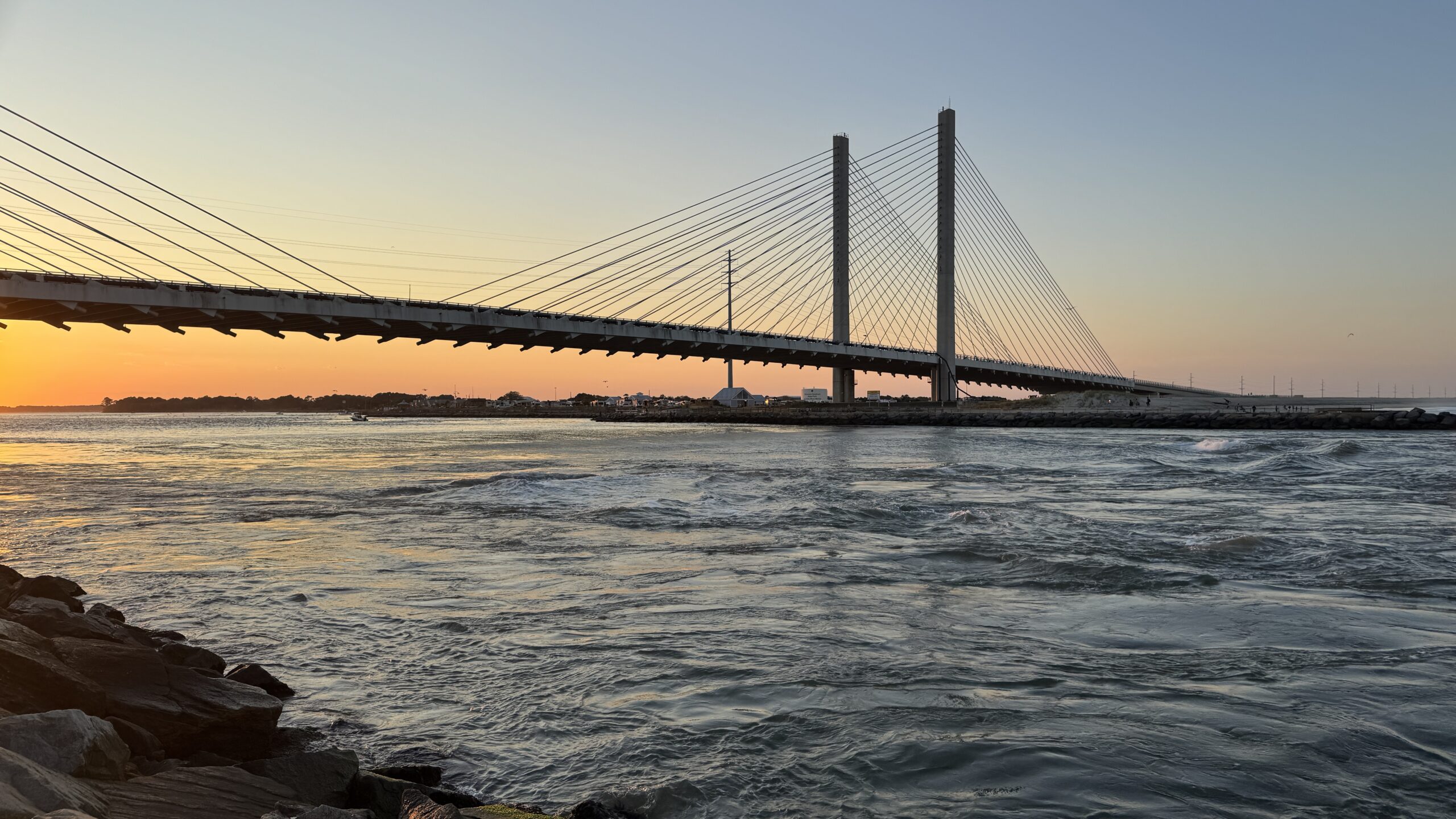 mindful living moment at Delaware bridge sunset symbolizing balance and recovery from work burnout