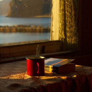 Evening light through sheer curtains with warm golden tones—symbolizing evening wind-down rituals and the calm of release.