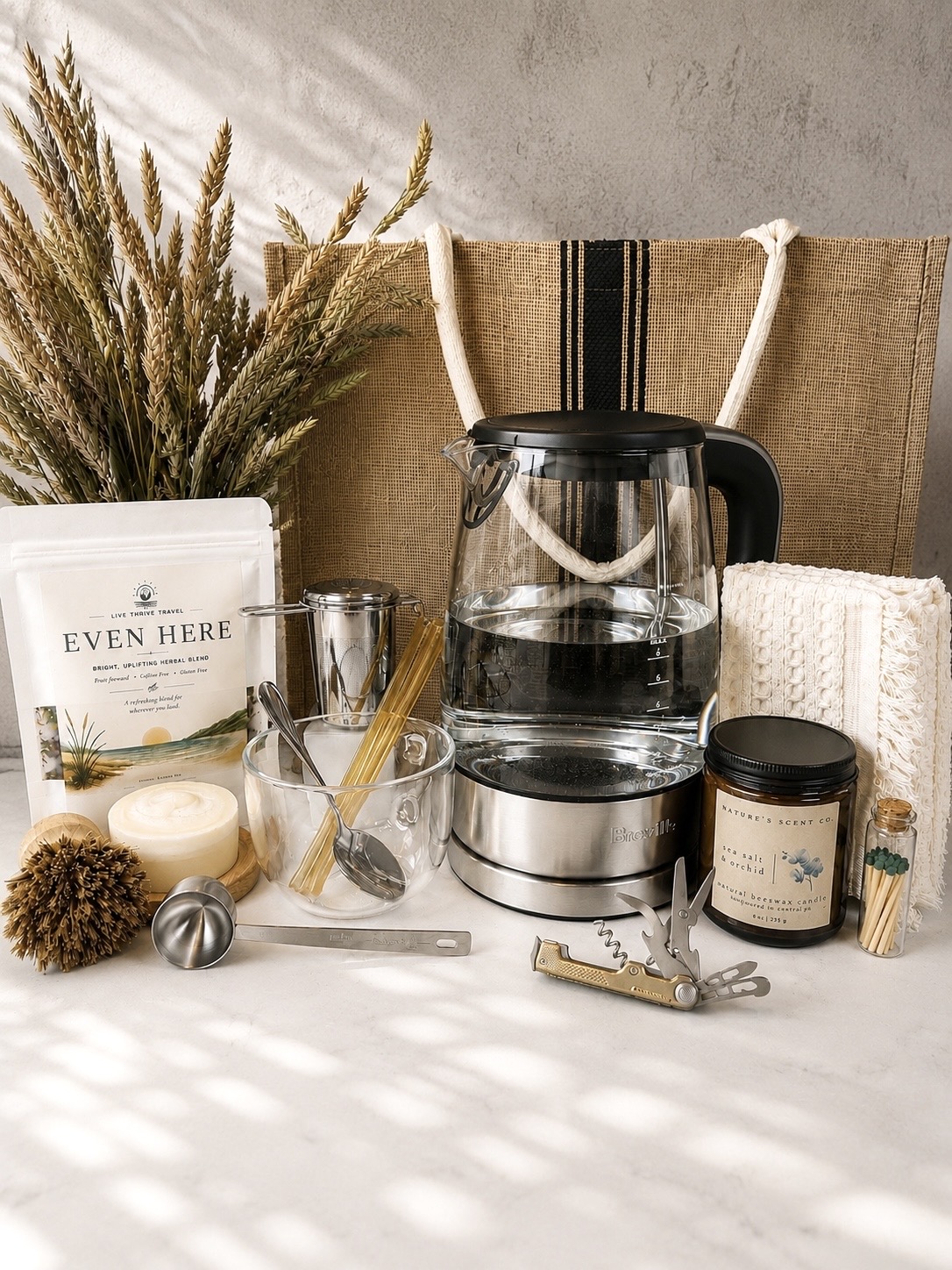 First Night Gift with Breville electric kettle, Even Here Herbal Tea, and thoughtful new home essentials.