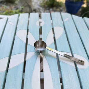 Stainless steel coffee and tea scoop included in the First Night Gift Collection for brewing coffee or measuring loose-leaf tea.