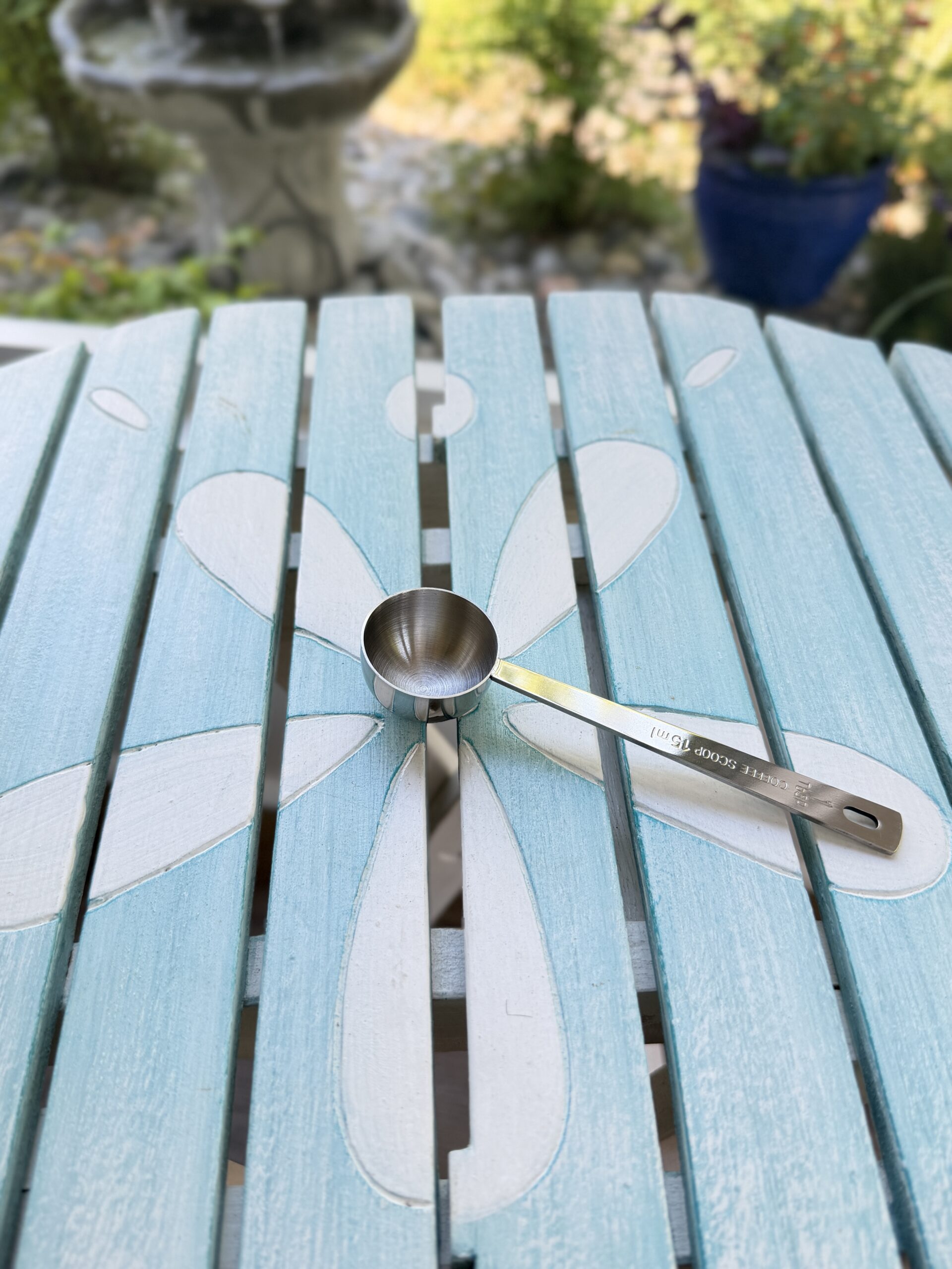 Stainless steel coffee and tea scoop included in the First Night Gift Collection for brewing coffee or measuring loose-leaf tea.