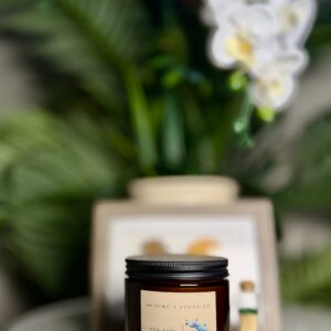 Nature's Scent Co. Sea Salt & Orchid 8 oz beeswax candle with wood wick and decorative match jar