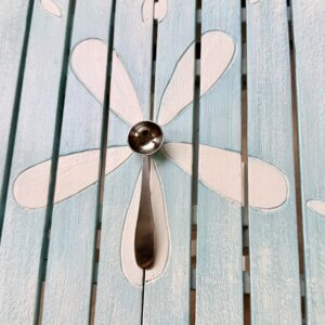 Stainless steel tea scoop for measuring loose leaf tea.
