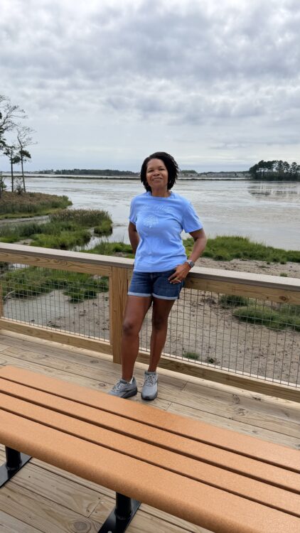 Accessible observation boardwalk overlooking marsh and water at Assawoman Wildlife Area.